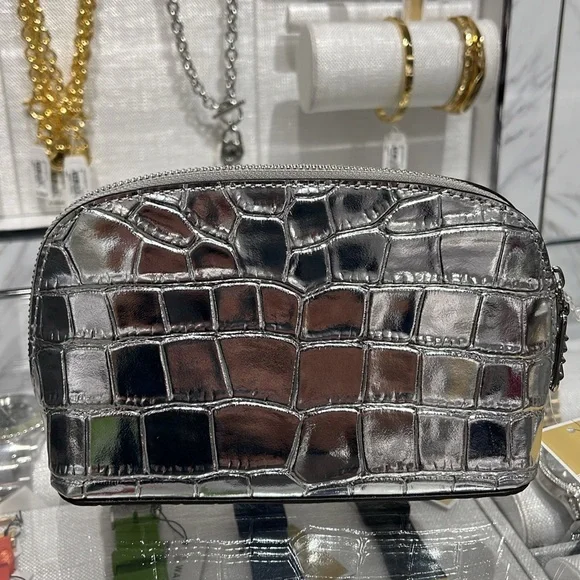 Michael Kors Empire Sm Metallic Crocodile Embossed Leather Travel Pouch
Silver - Picture 5 of 16